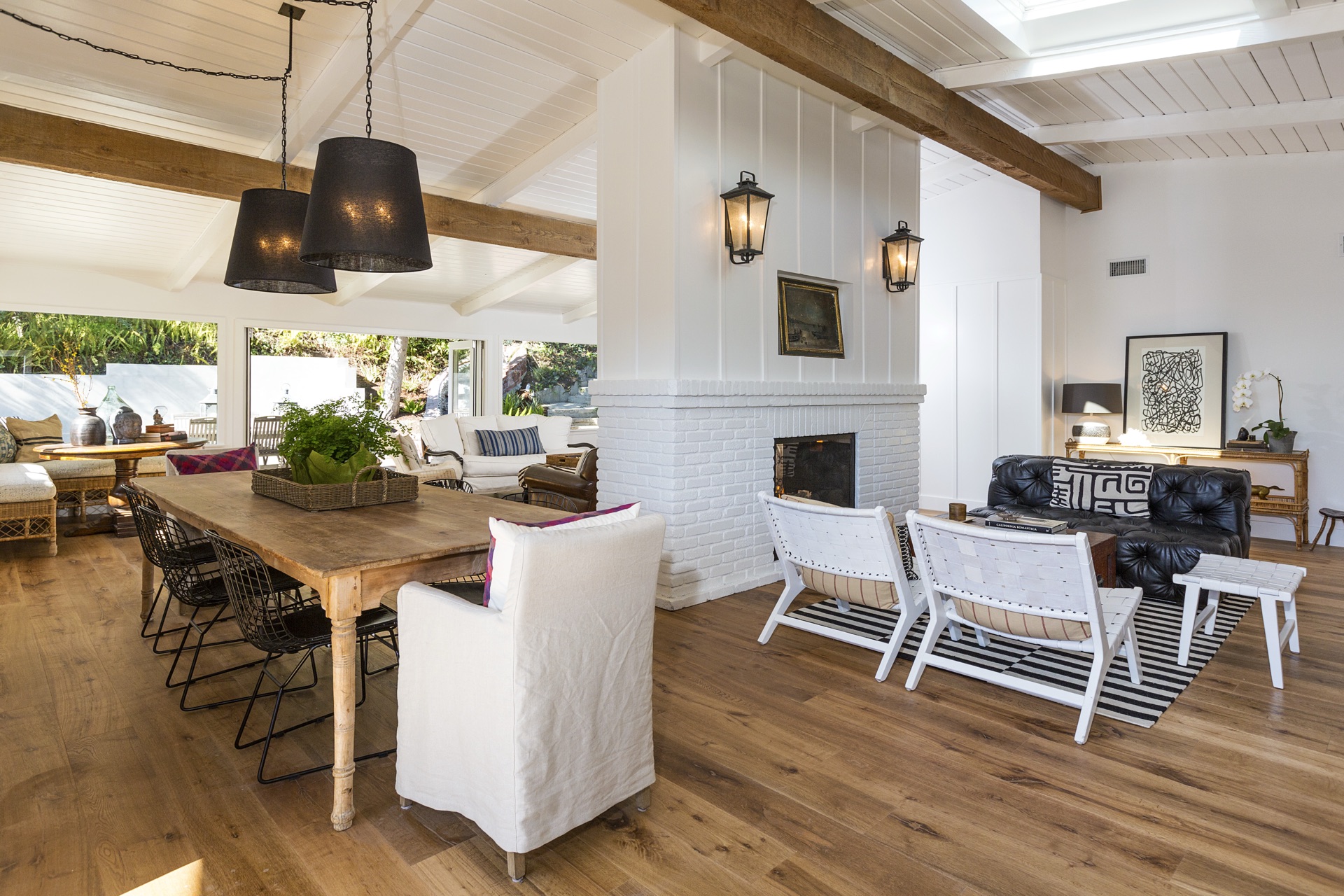 Open-plan living and dining. California beach cottage